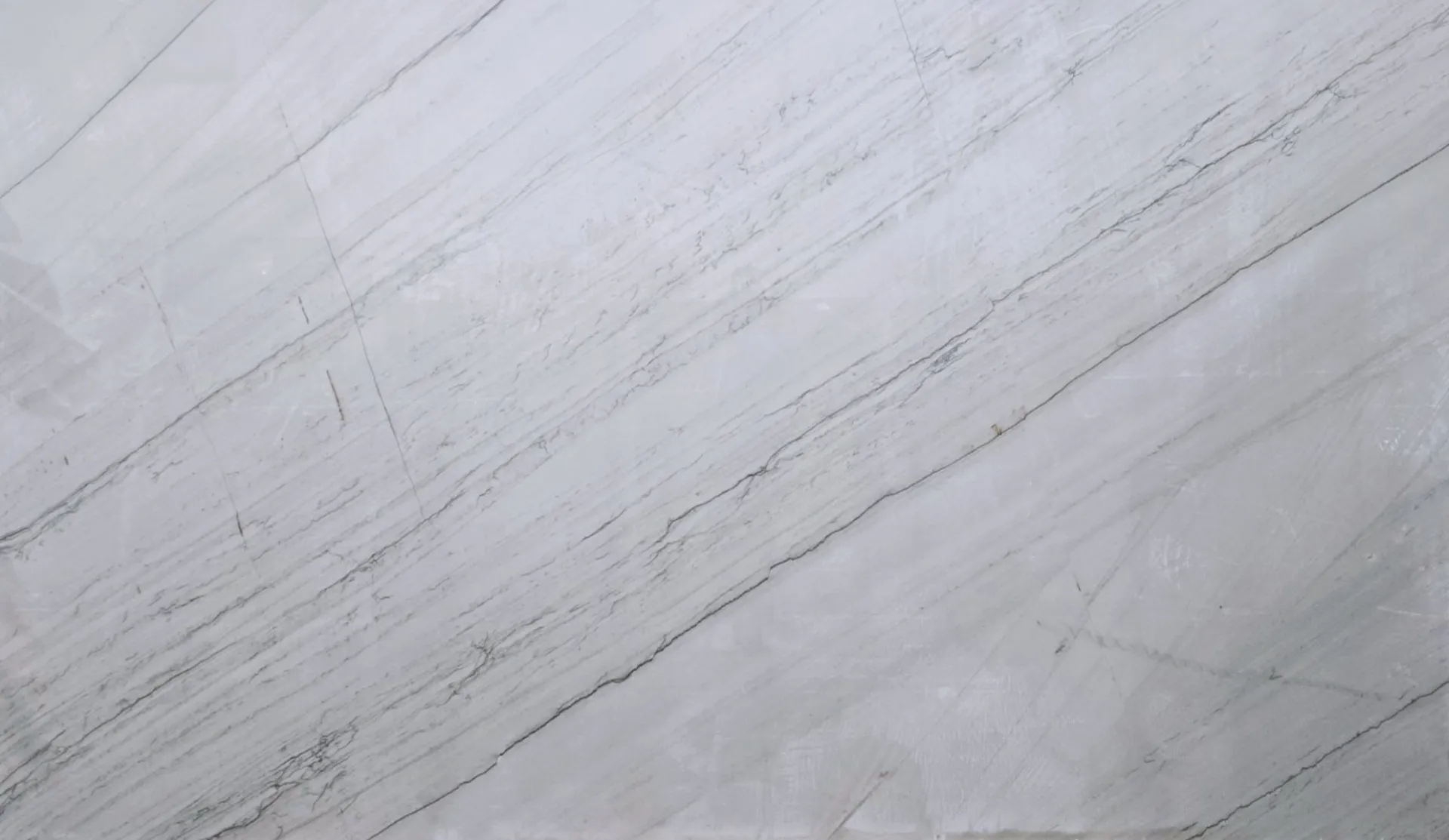Closeup image of Mare Bianco Grey Quartzite countertop slab