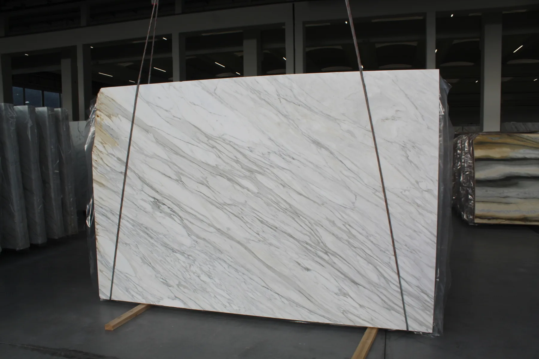 Closeup image of Calacatta Cremo White Marble countertop slab