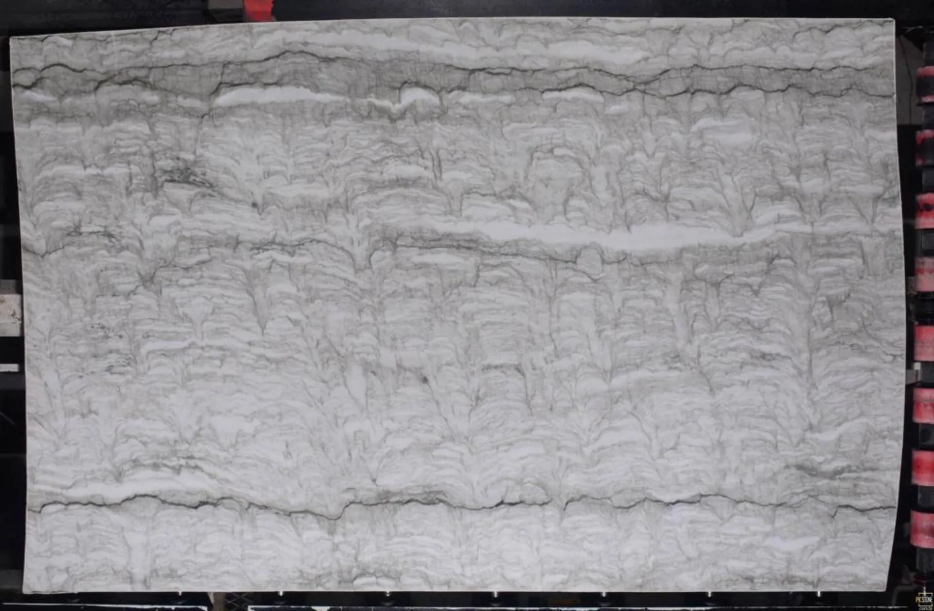 Closeup image of Bianco Laura 1st Choice Grey Quartzite countertop slab