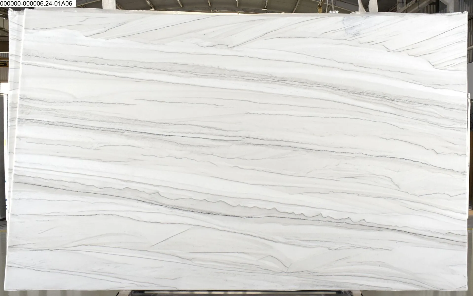 Closeup image of Ivory Macaubas 1st Choice White Quartzite countertop slab