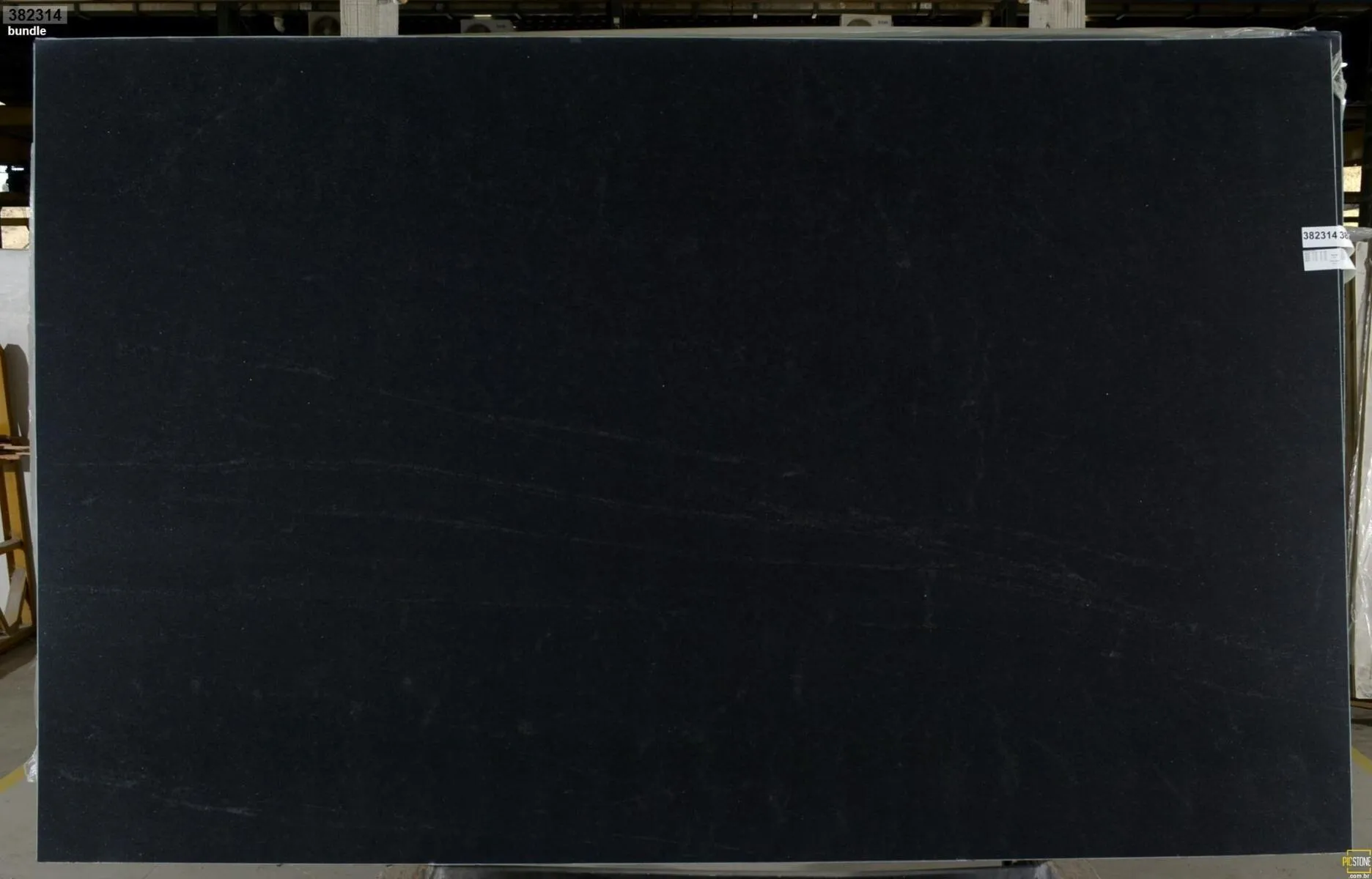 Closeup image of Ebony (Negresco) Black Granite countertop slab