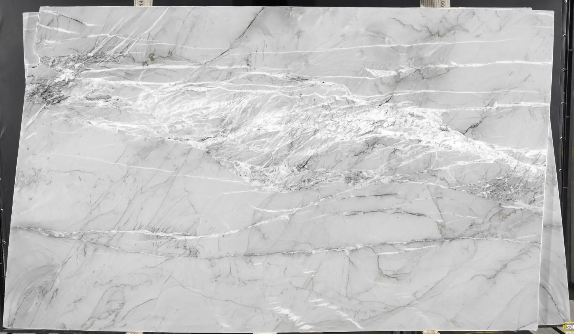 Closeup image of Luce Di Luna Classico Grey Quartzite countertop slab
