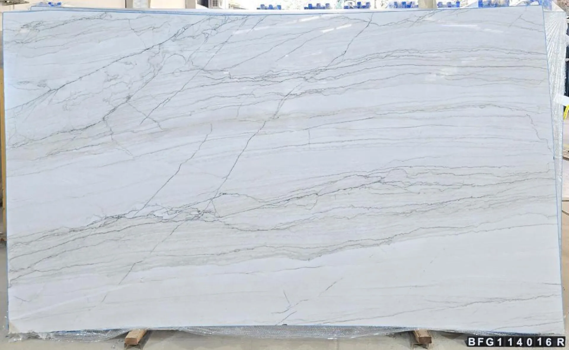 Closeup image of White Santorini Grey Quartzite countertop slab