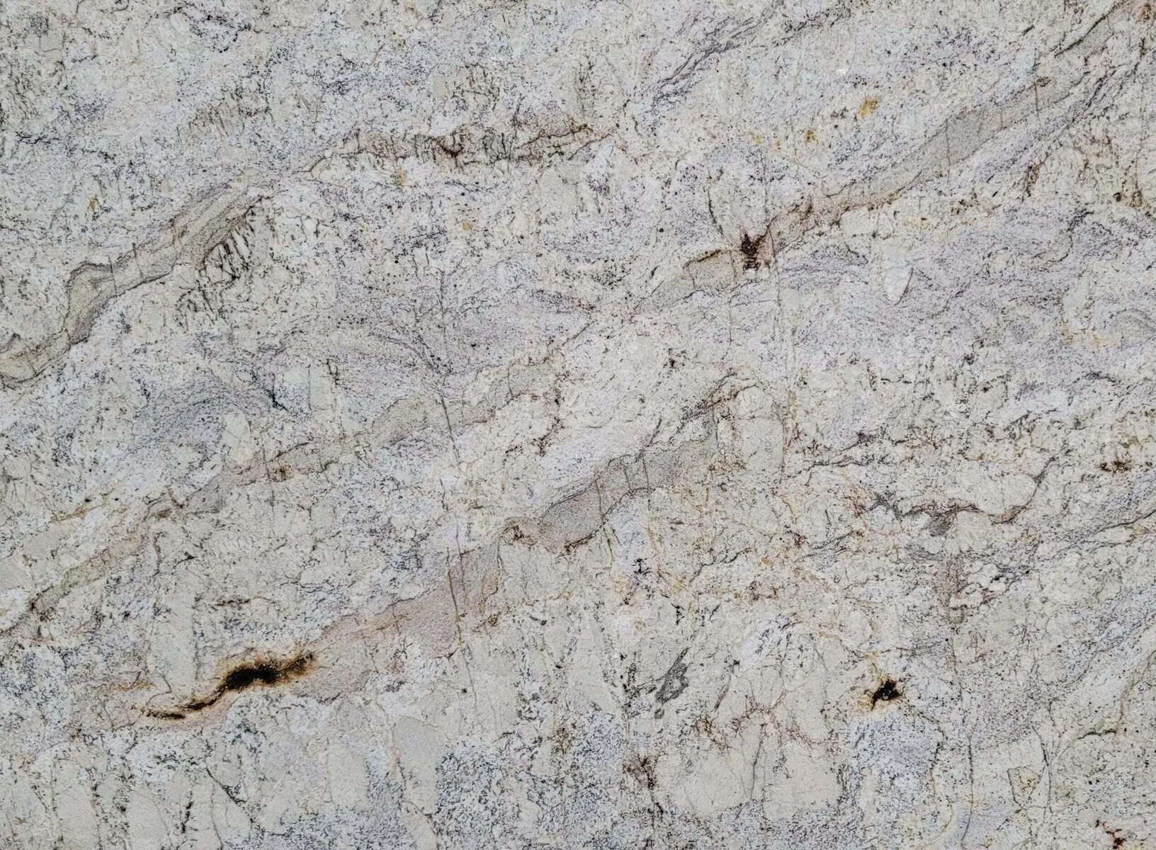 Closeup image of White Paradise Beige Granite countertop slab