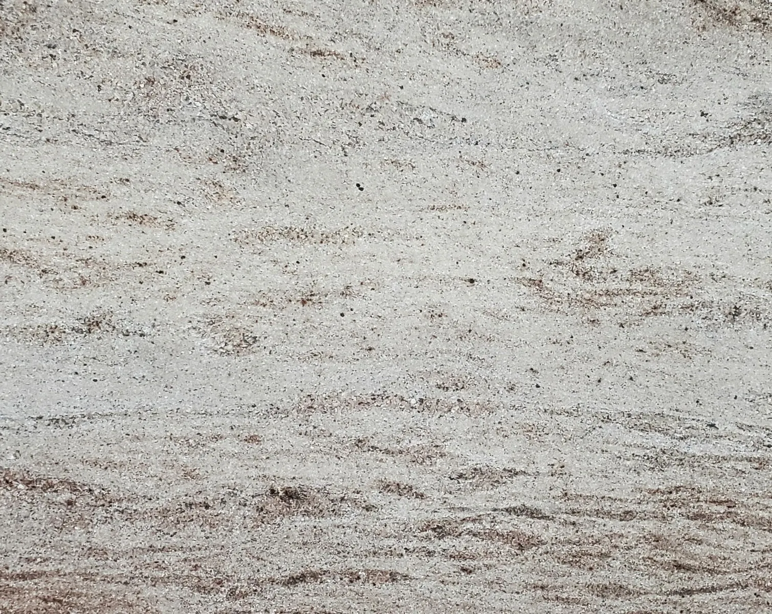 Closeup image of Astoria Gold Beige Granite countertop slab