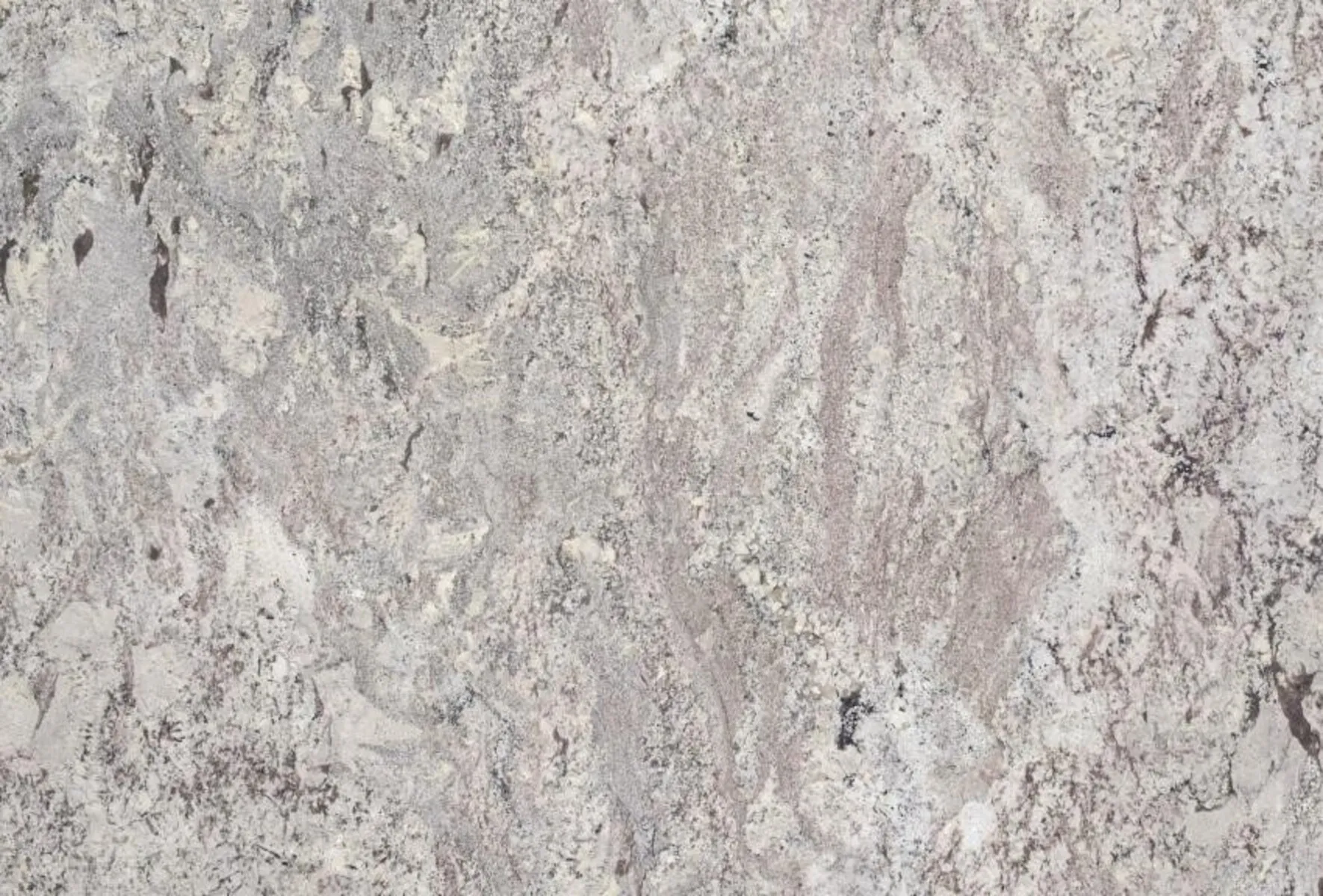 Closeup image of Mystic Spring Beige Granite countertop slab