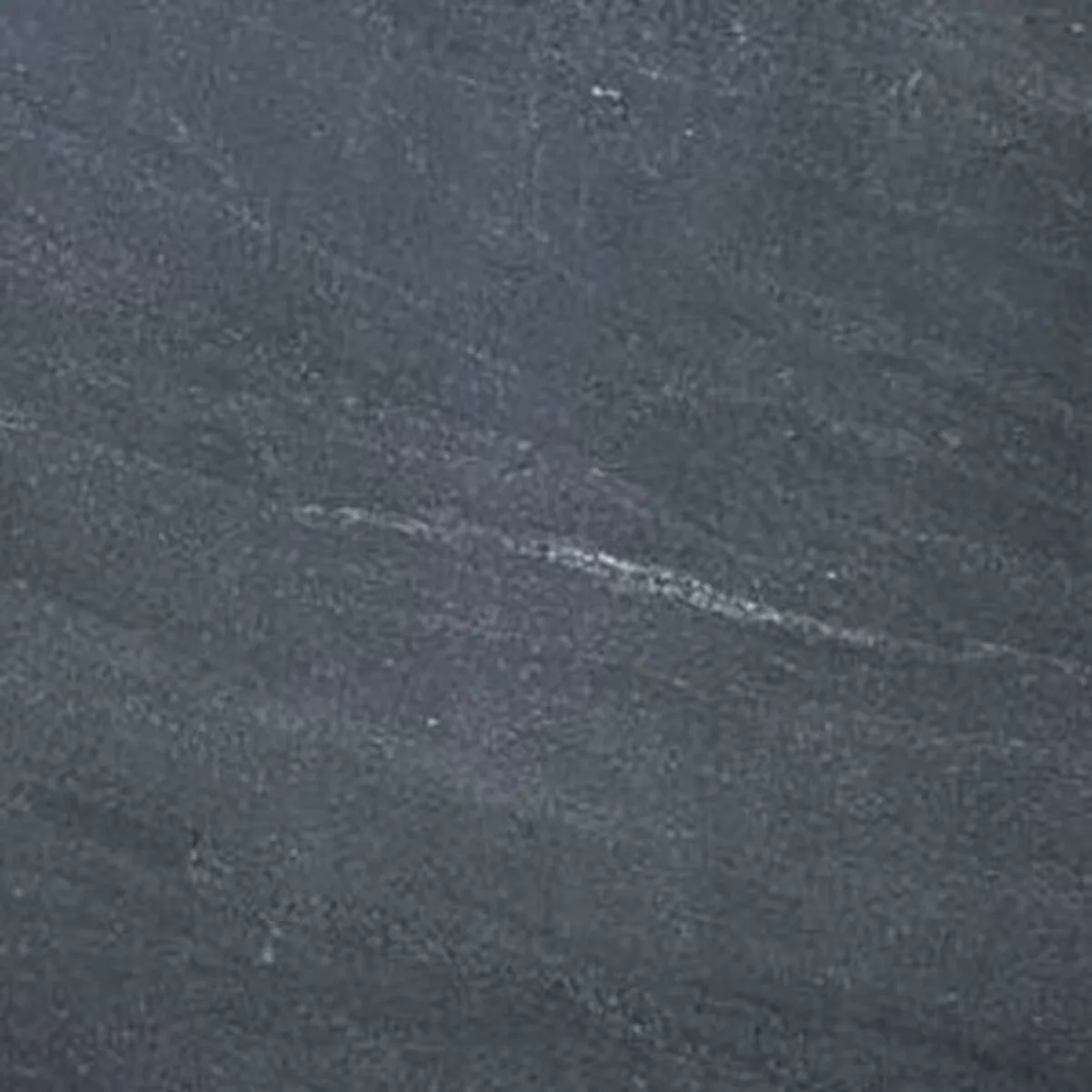 Closeup image of Black Mist Grey Granite countertop slab