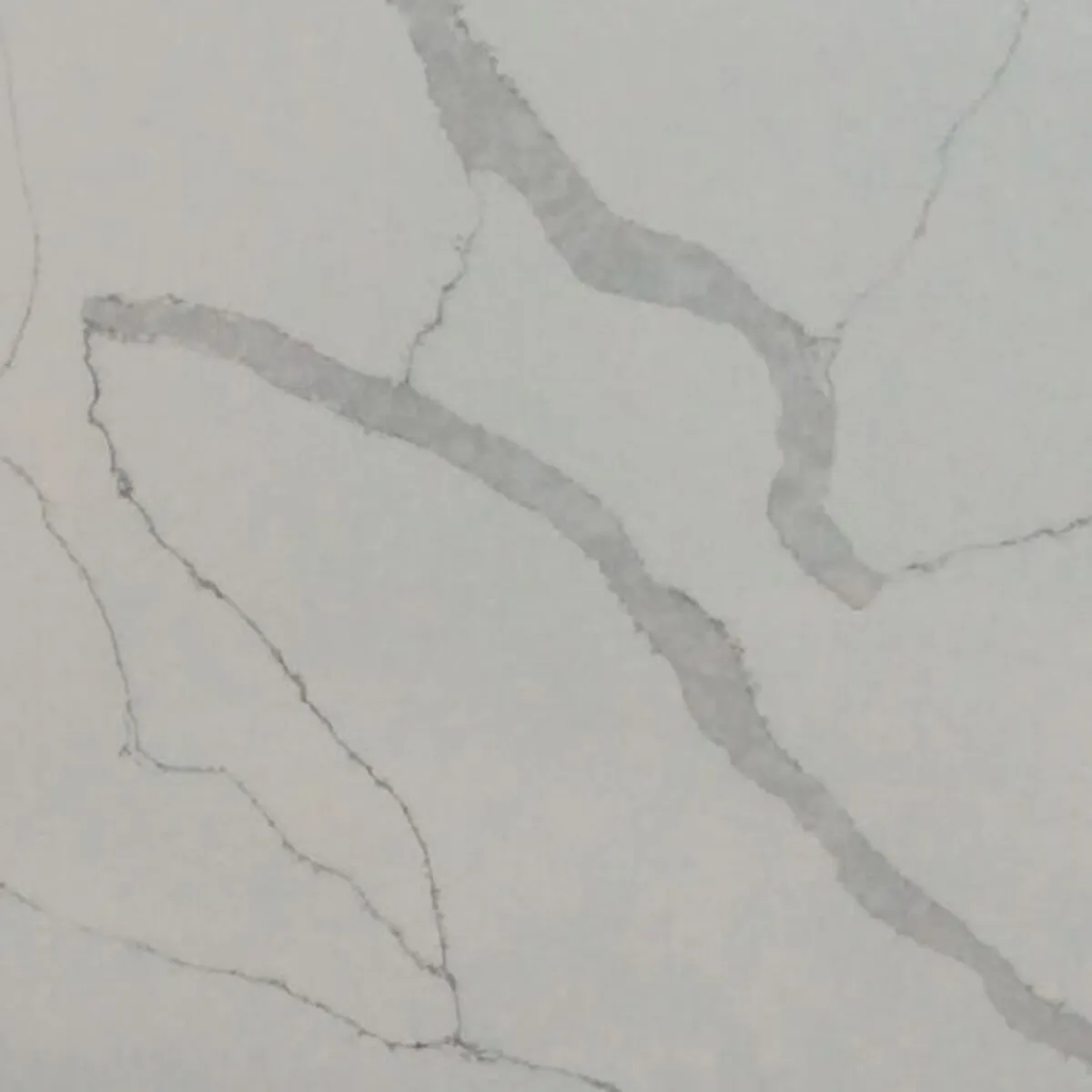 Closeup image of Aggranite Quartz Calacatta Simplex White Quartz countertop slab
