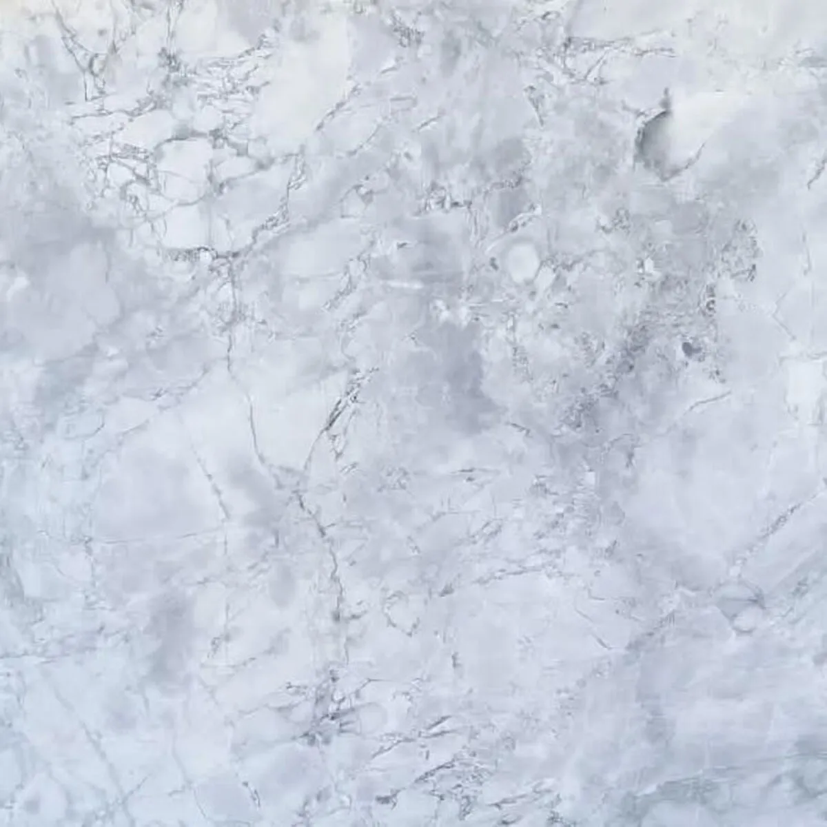 Closeup image of Calacatta Super White Grey Marble countertop slab