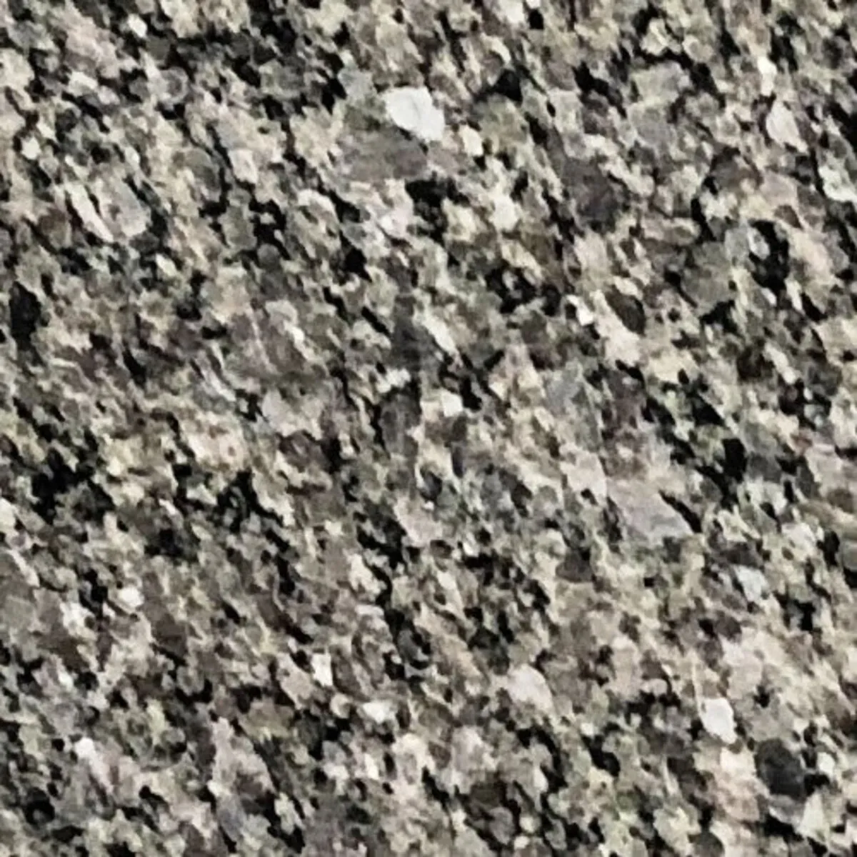 Closeup image of Caledonia Grey Granite countertop slab