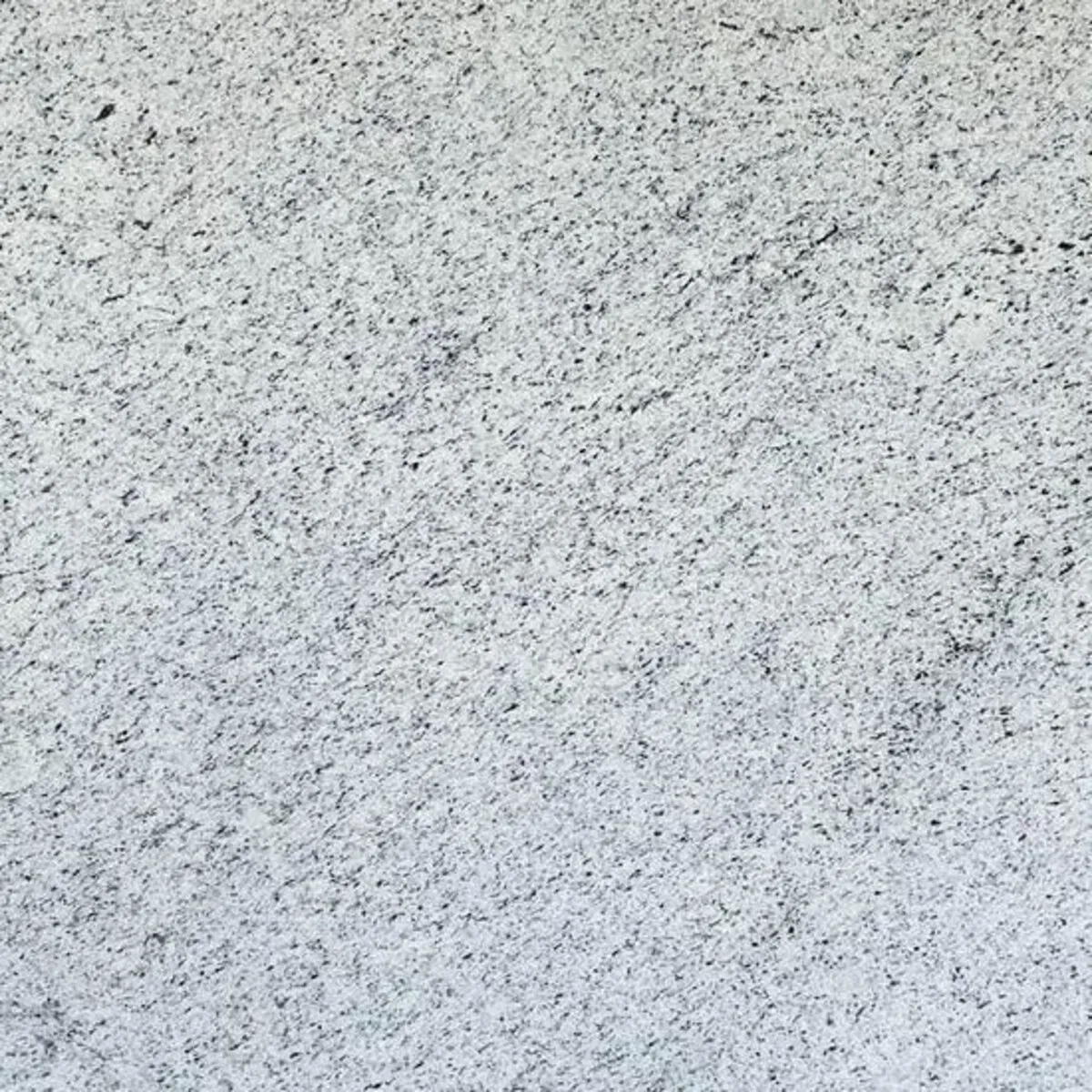 Closeup image of Dallas White Grey Granite countertop slab