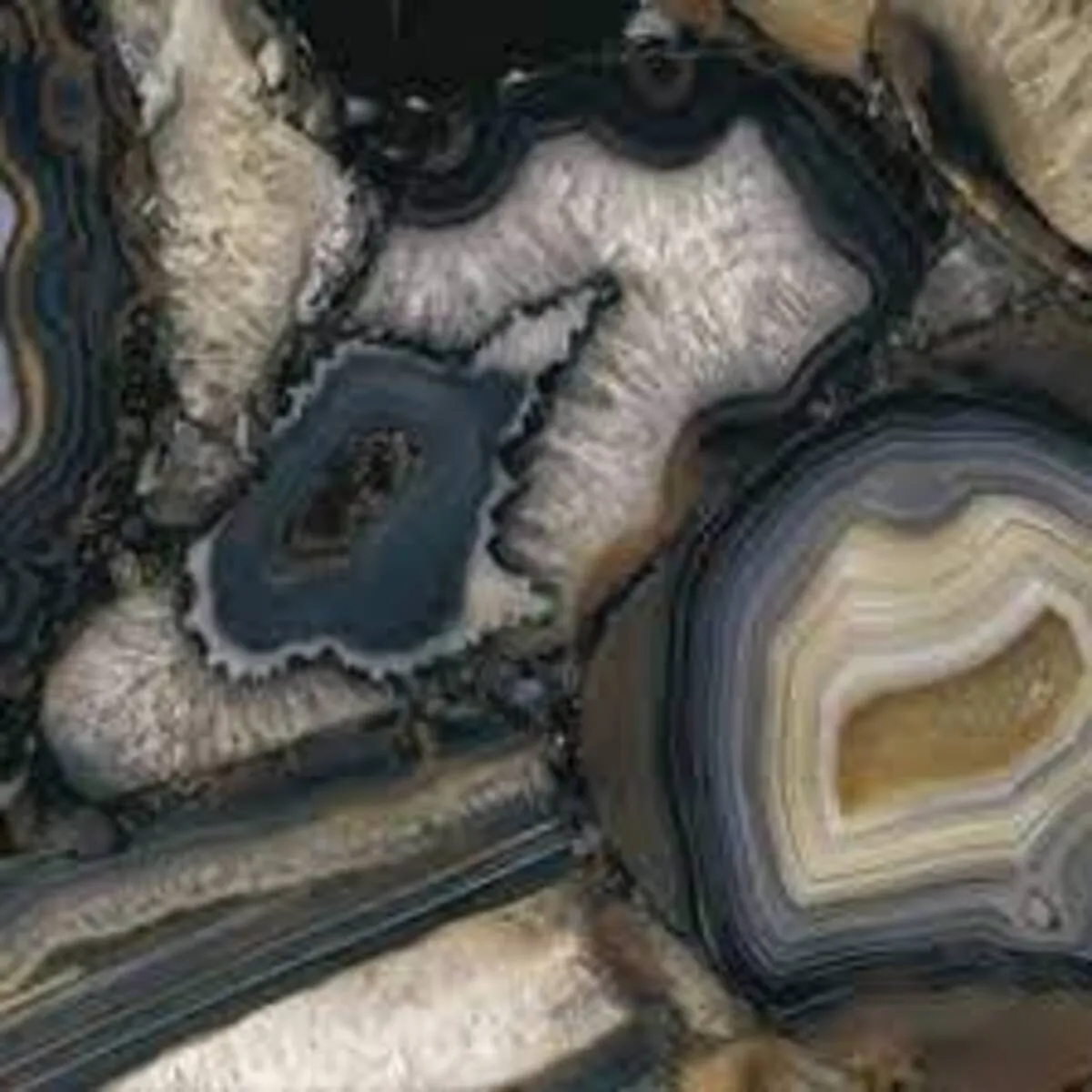 Closeup image of Aggranite Porcelain Agate Black Lappato Black Porcelain countertop slab