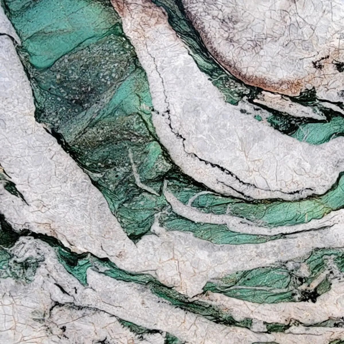 Closeup image of Fuchsite Crystal Green Quartzite countertop slab