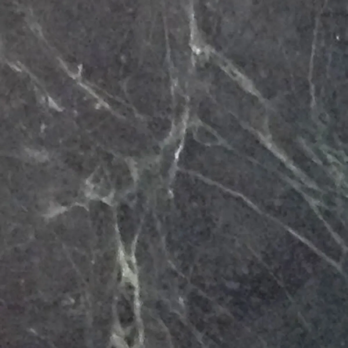 Closeup image of Green Soapstone Grey Soapstone countertop slab