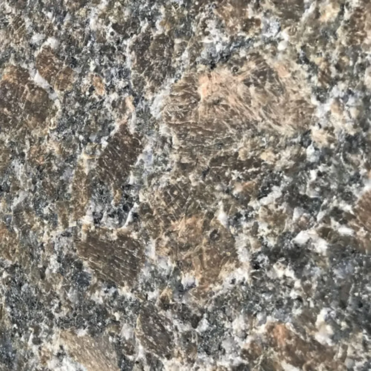 Closeup image of India Copper Brown Brown Granite countertop slab