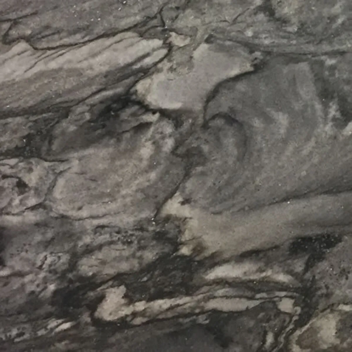 Closeup image of London Smoke Grey Quartzite countertop slab