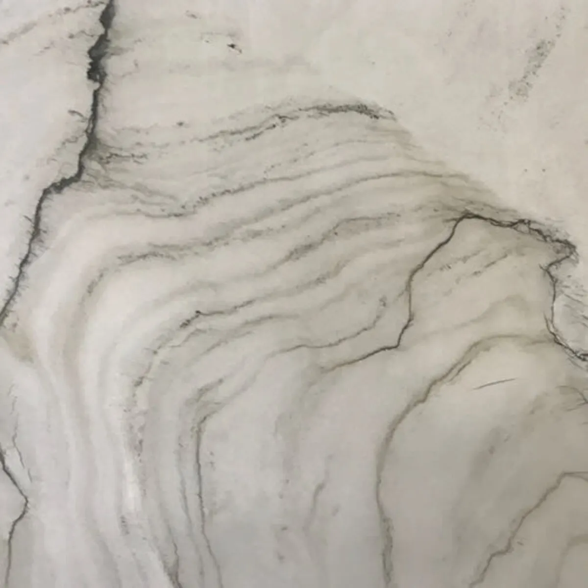 Closeup image of Luna Cream Quartzite countertop slab