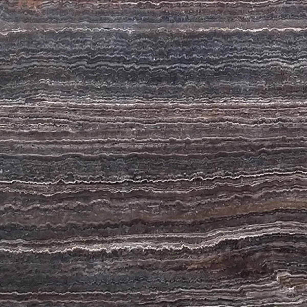 Closeup image of Mahogany Brown Travertine countertop slab
