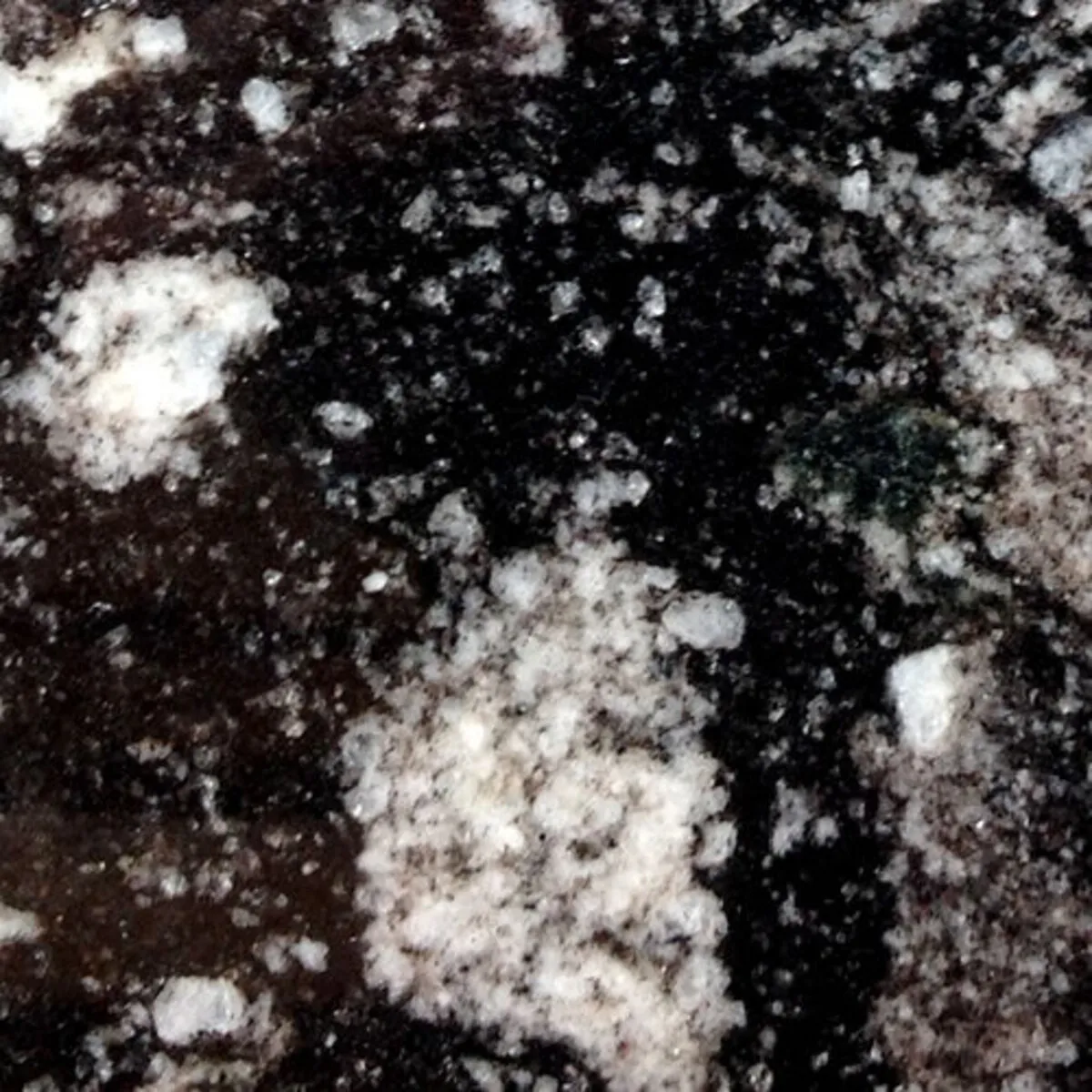 Closeup image of Manhattan Black Granite countertop slab