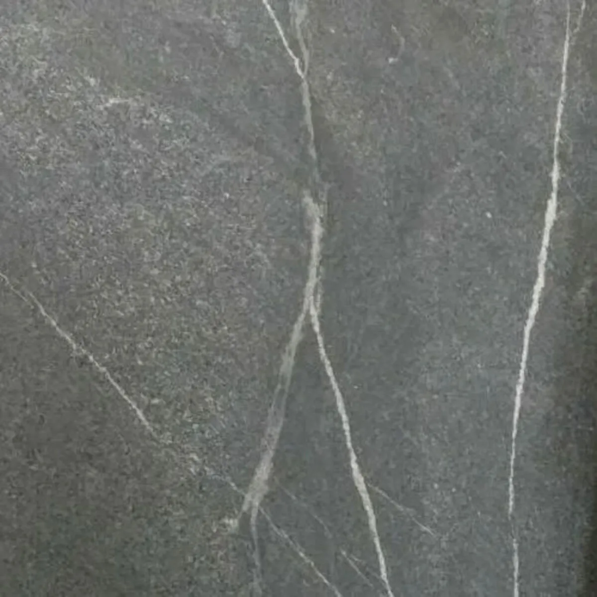 Closeup image of Nero Boreale Grey Granite countertop slab
