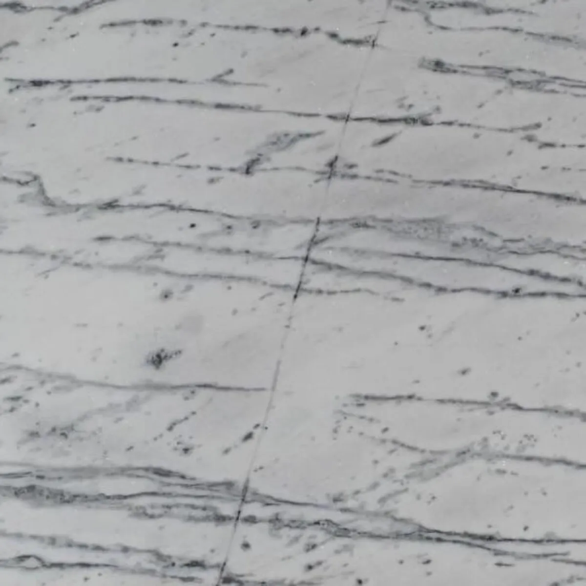 Closeup image of Nuvolato White Marble countertop slab