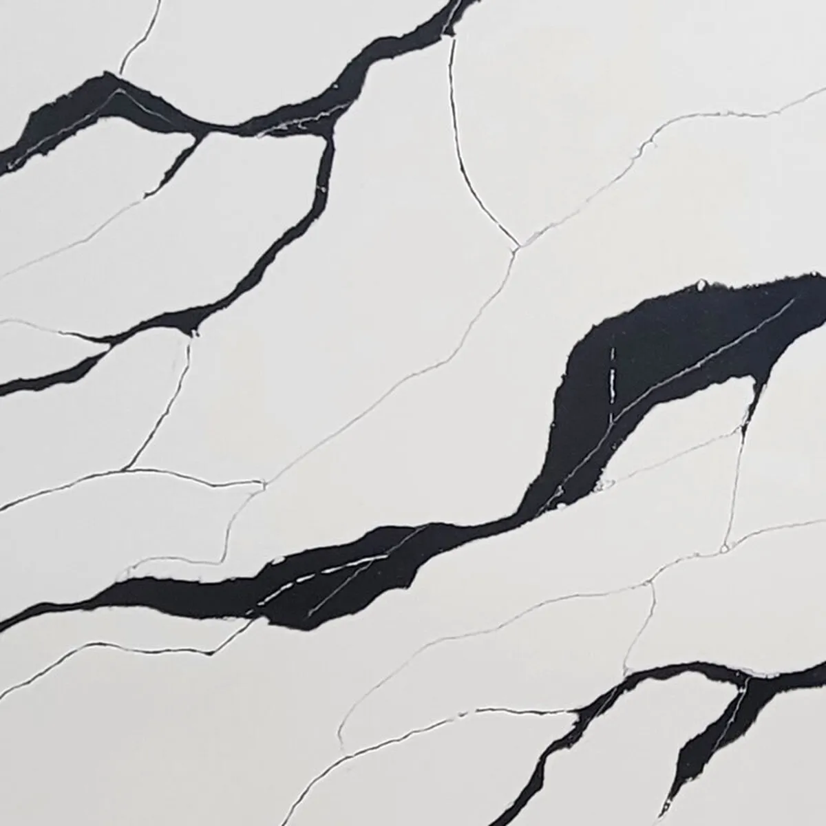 Closeup image of Aggranite Quartz Panda White Quartz countertop slab