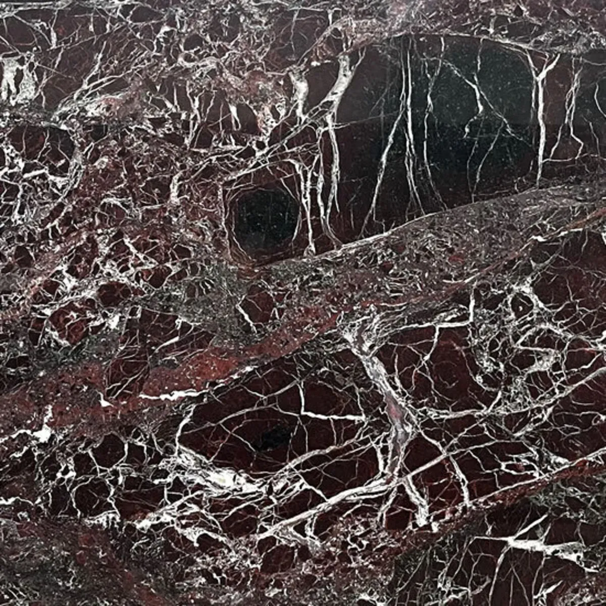 Closeup image of Rosso Levento Red Marble countertop slab