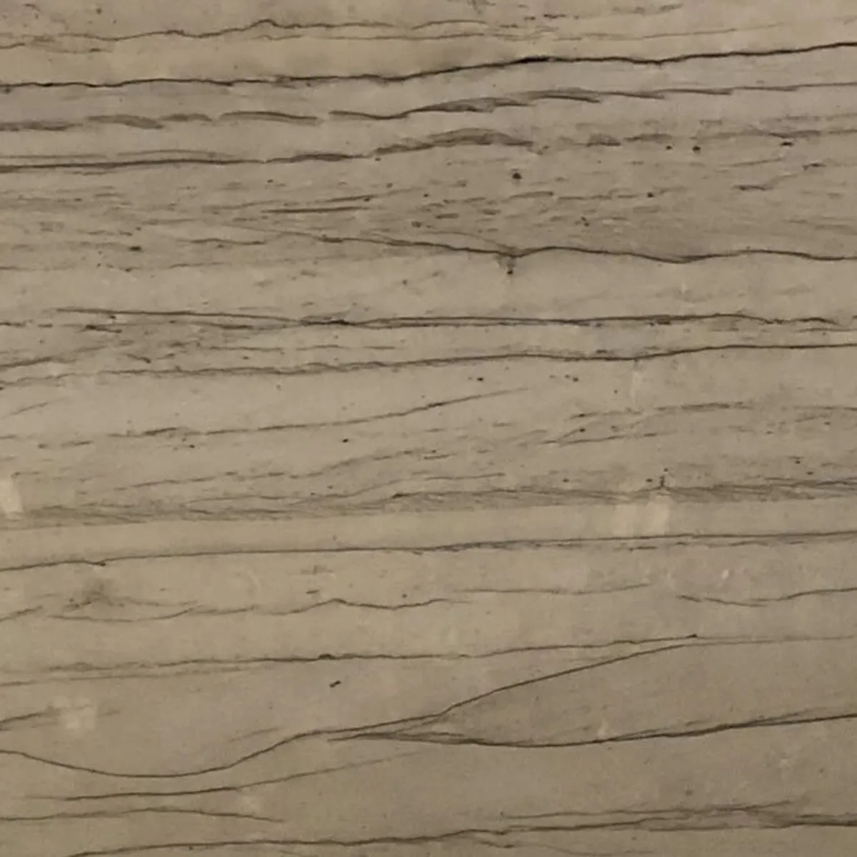 Closeup image of Silk Macaubas Beige Quartzite countertop slab