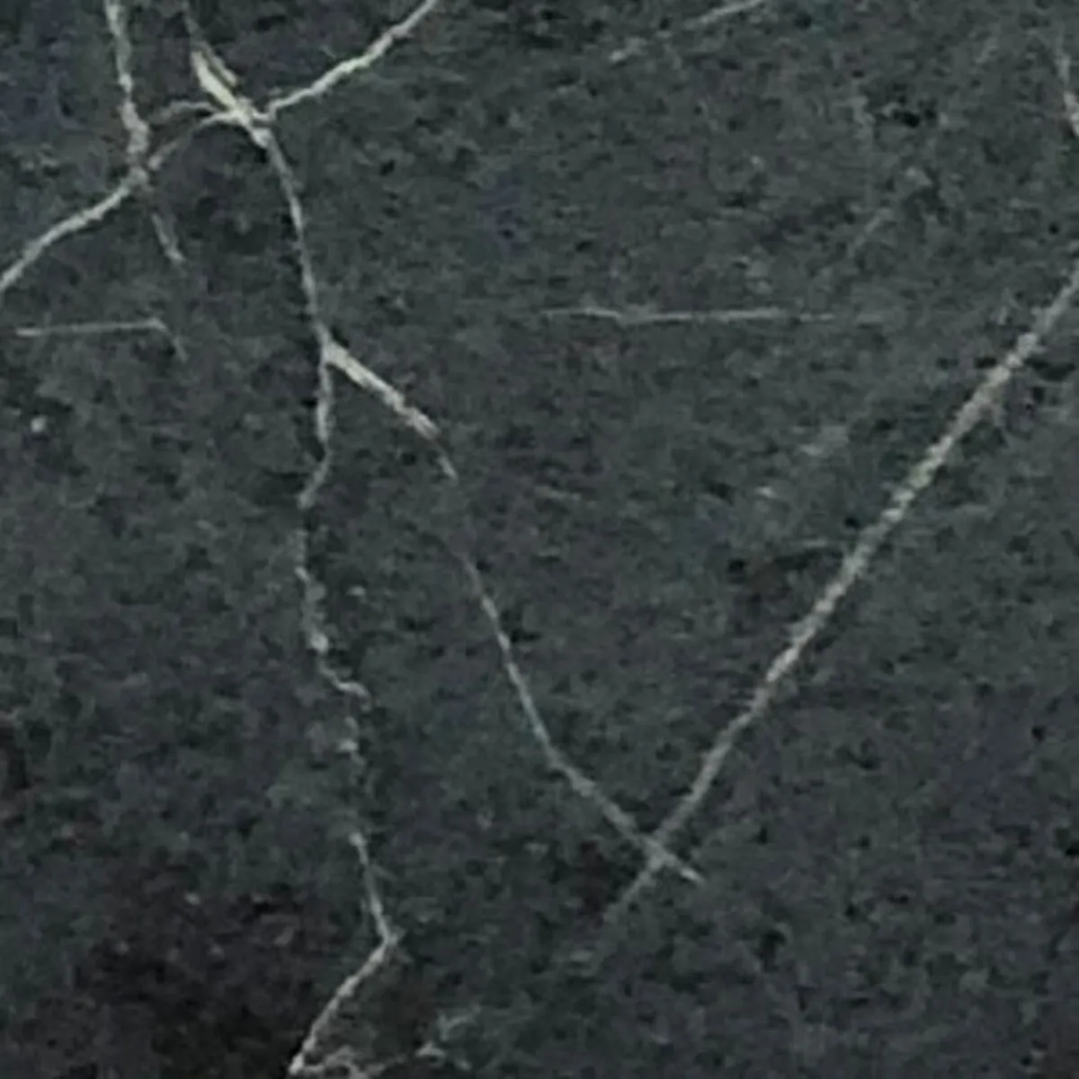 Closeup image of Soapstone Black Black Soapstone countertop slab
