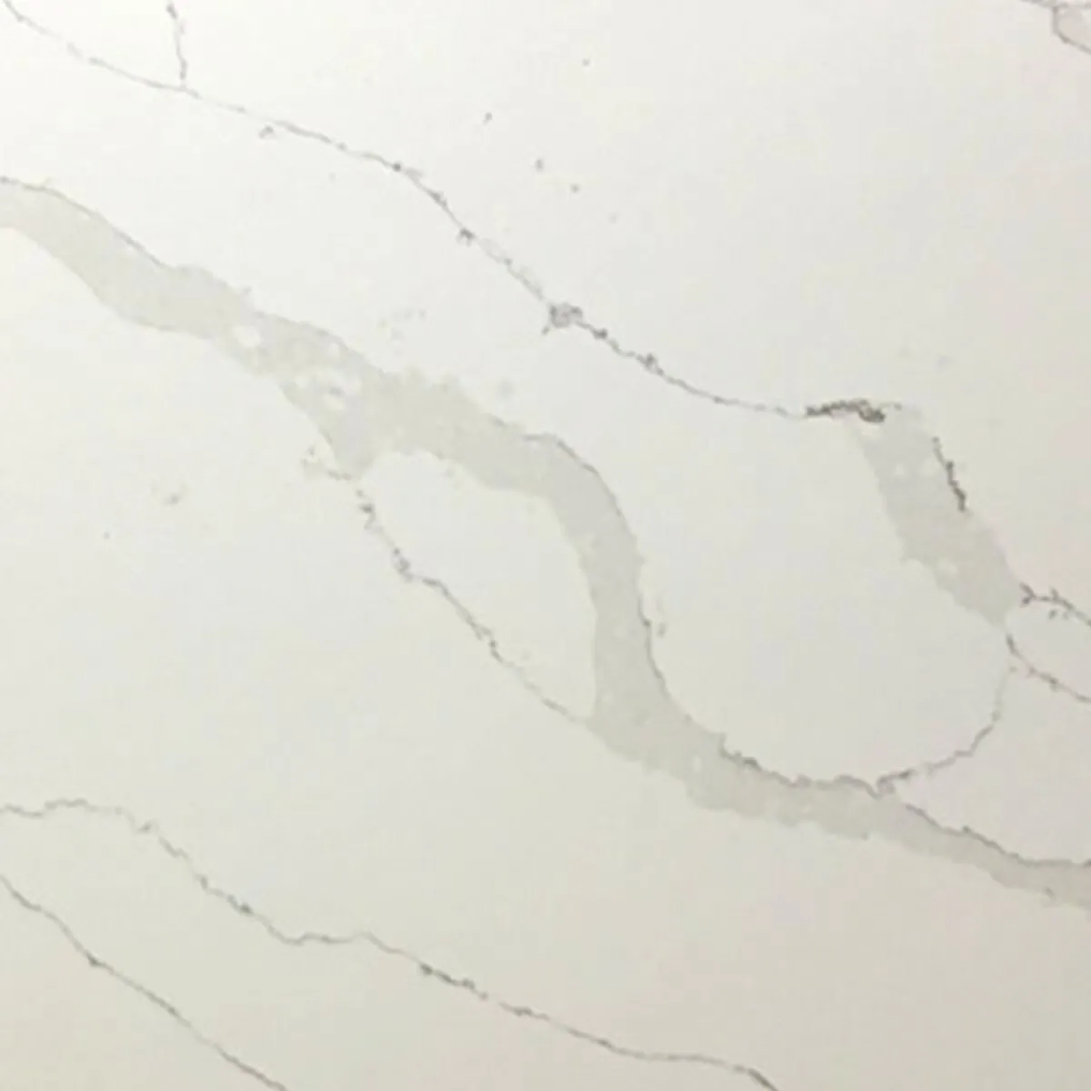 Closeup image of Aggranite Quartz Statuary Massa White Quartz countertop slab
