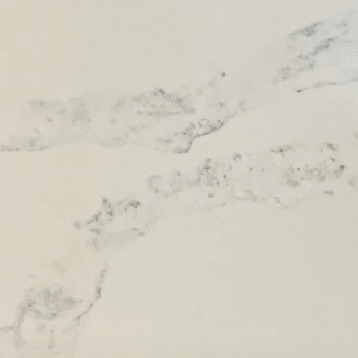 Closeup image of Aggranite Quartz Statuary Palermo Cream Quartz countertop slab