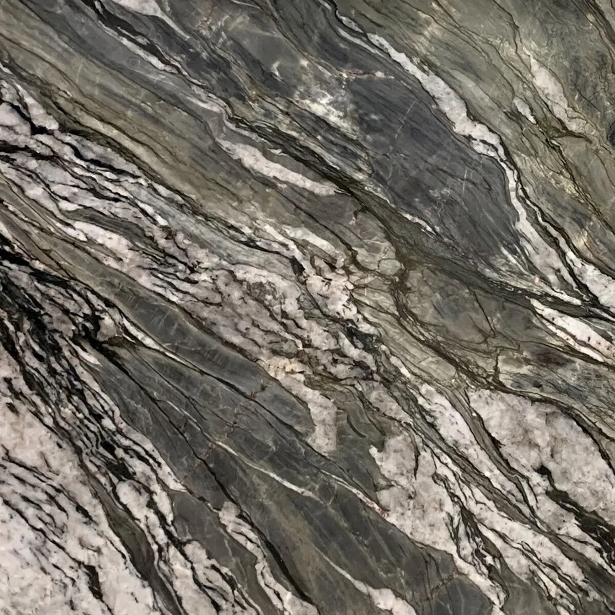 Closeup image of Tempest Blue Green Quartzite countertop slab