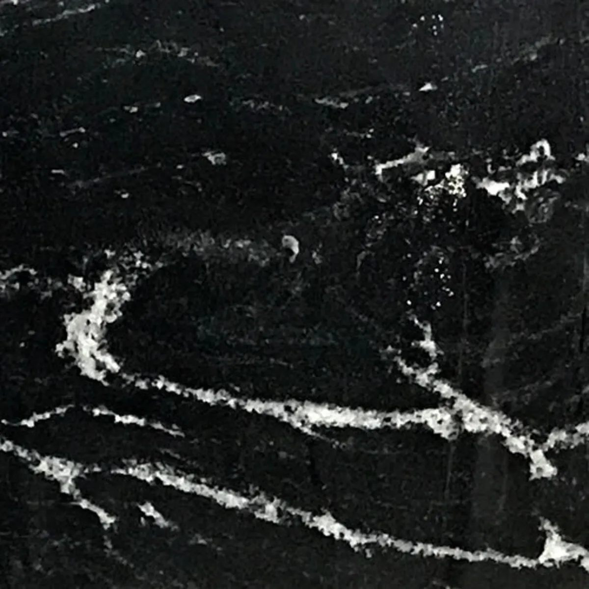 Closeup image of Via Lattea Black Granite countertop slab