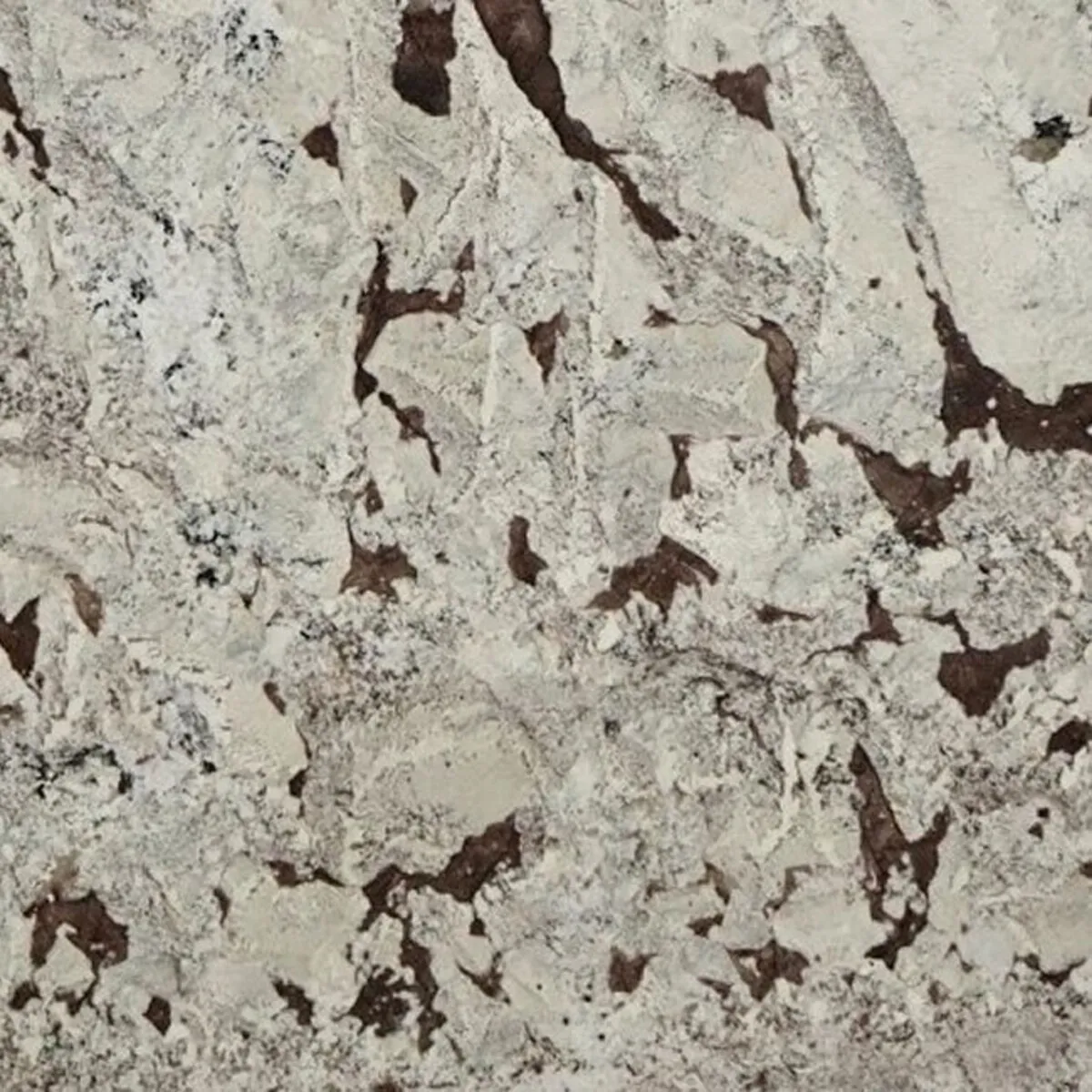 Closeup image of White Picasso Cream Granite countertop slab