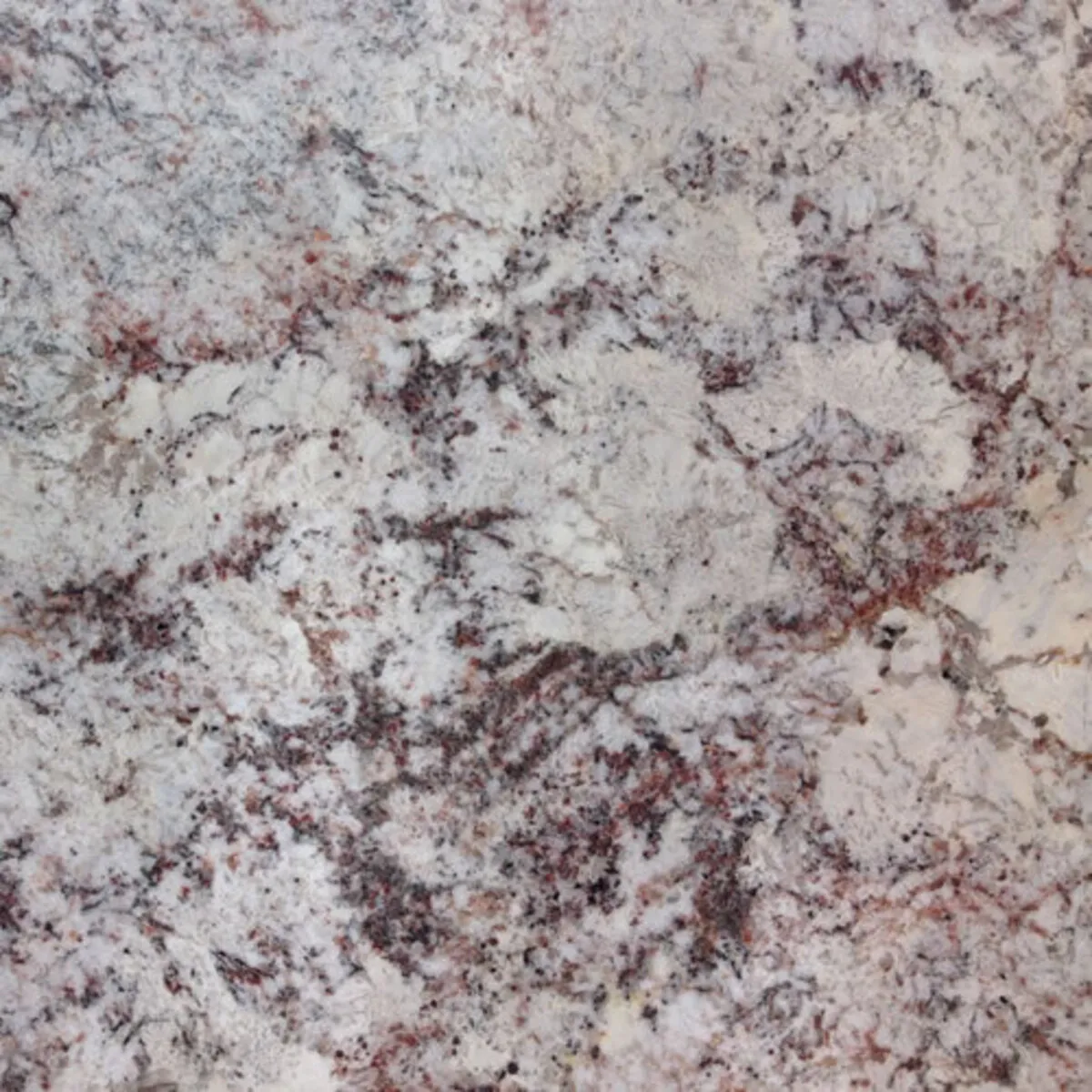 Closeup image of White Spring White Granite countertop slab