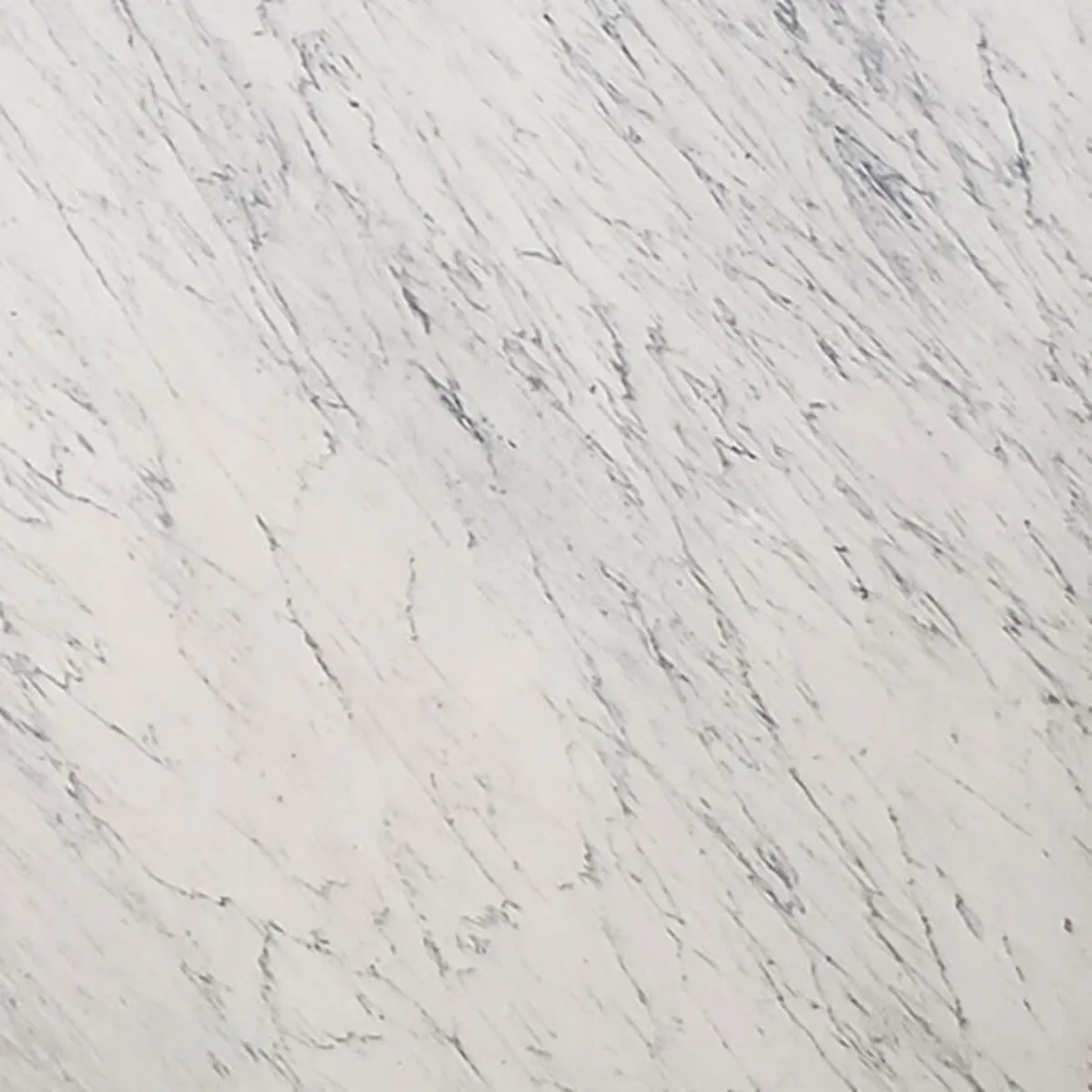 Closeup image of White Venatino Select White Marble countertop slab