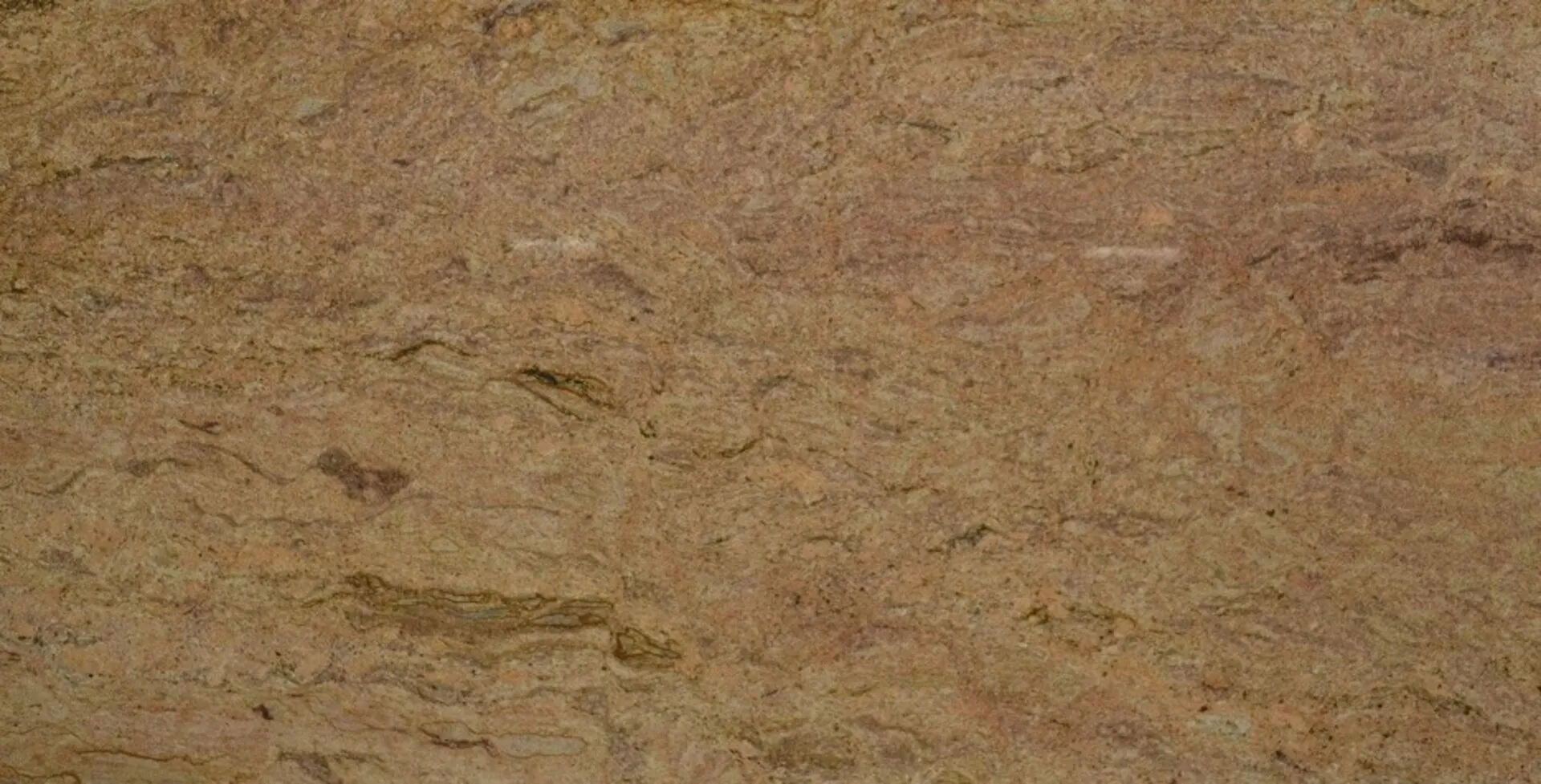 Closeup image of Madura Gold Brown Granite countertop slab