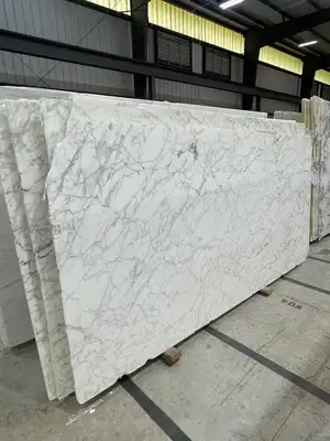 Closeup image of Calacatta Spider White Marble countertop slab