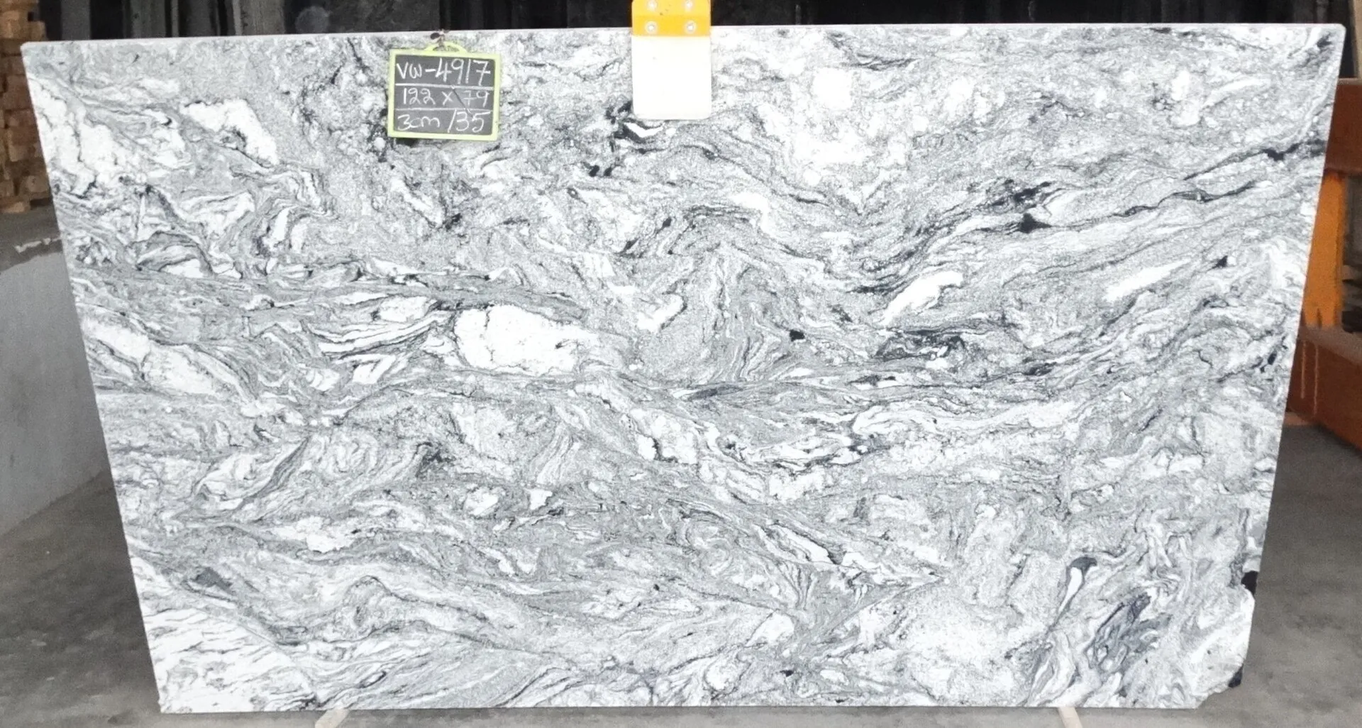 Closeup image of Cloudy White (Viscont White 1st Choice) Grey Granite countertop slab