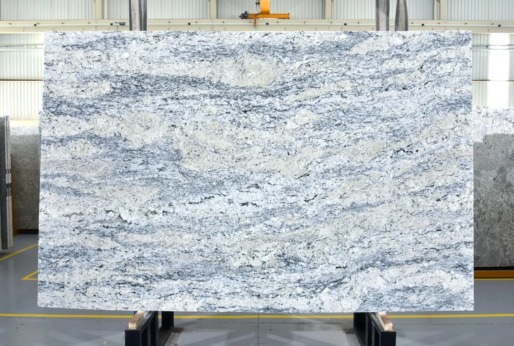 Closeup image of White Ice 1st Choice Grey Granite countertop slab