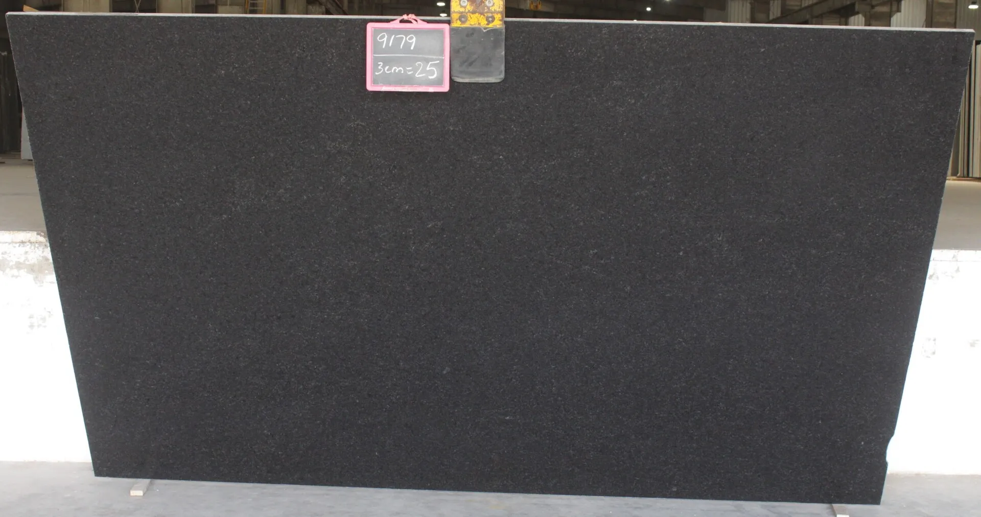 Closeup image of Black Pearl Black Granite countertop slab
