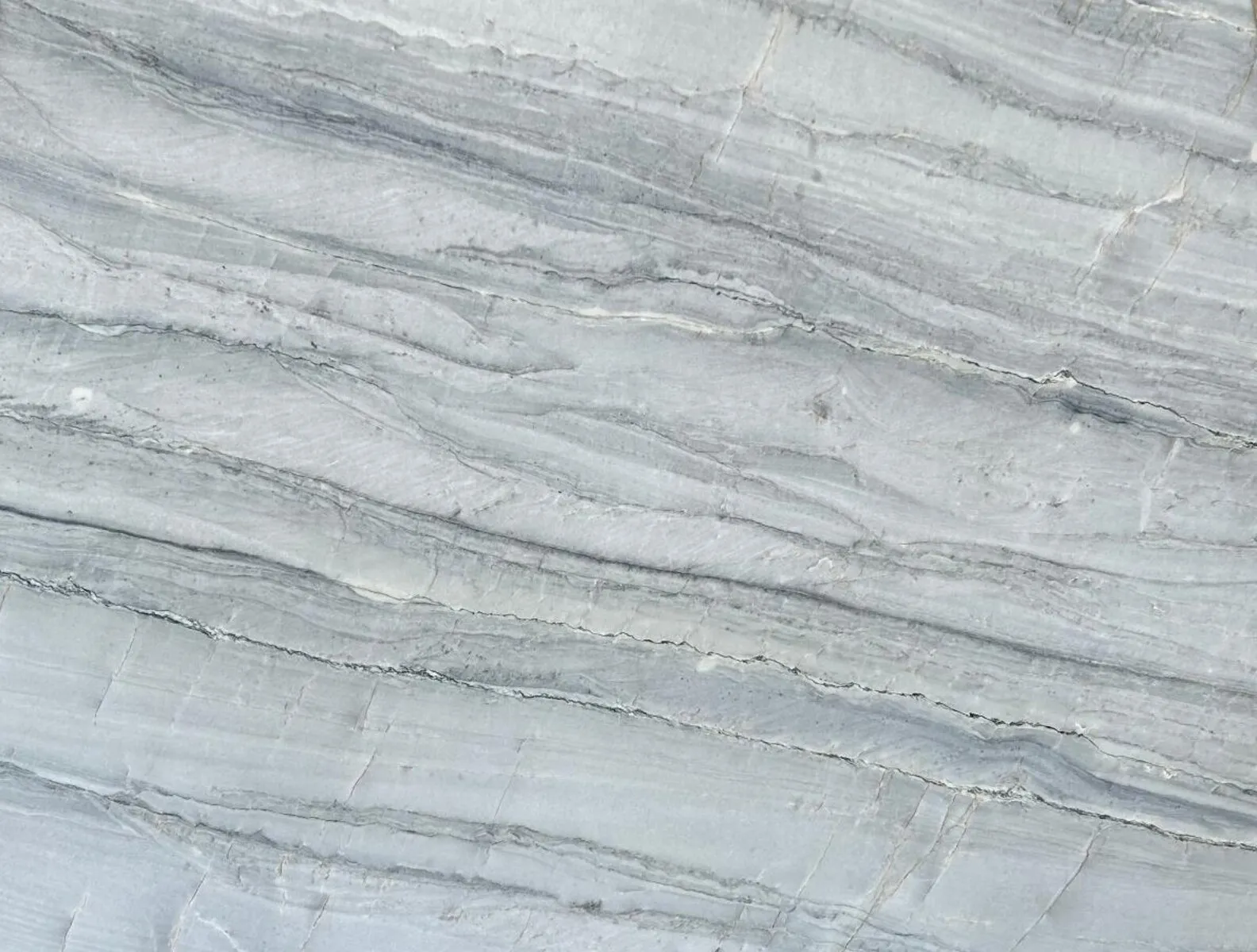 Closeup image of Platinus Light Grey Quartzite countertop slab