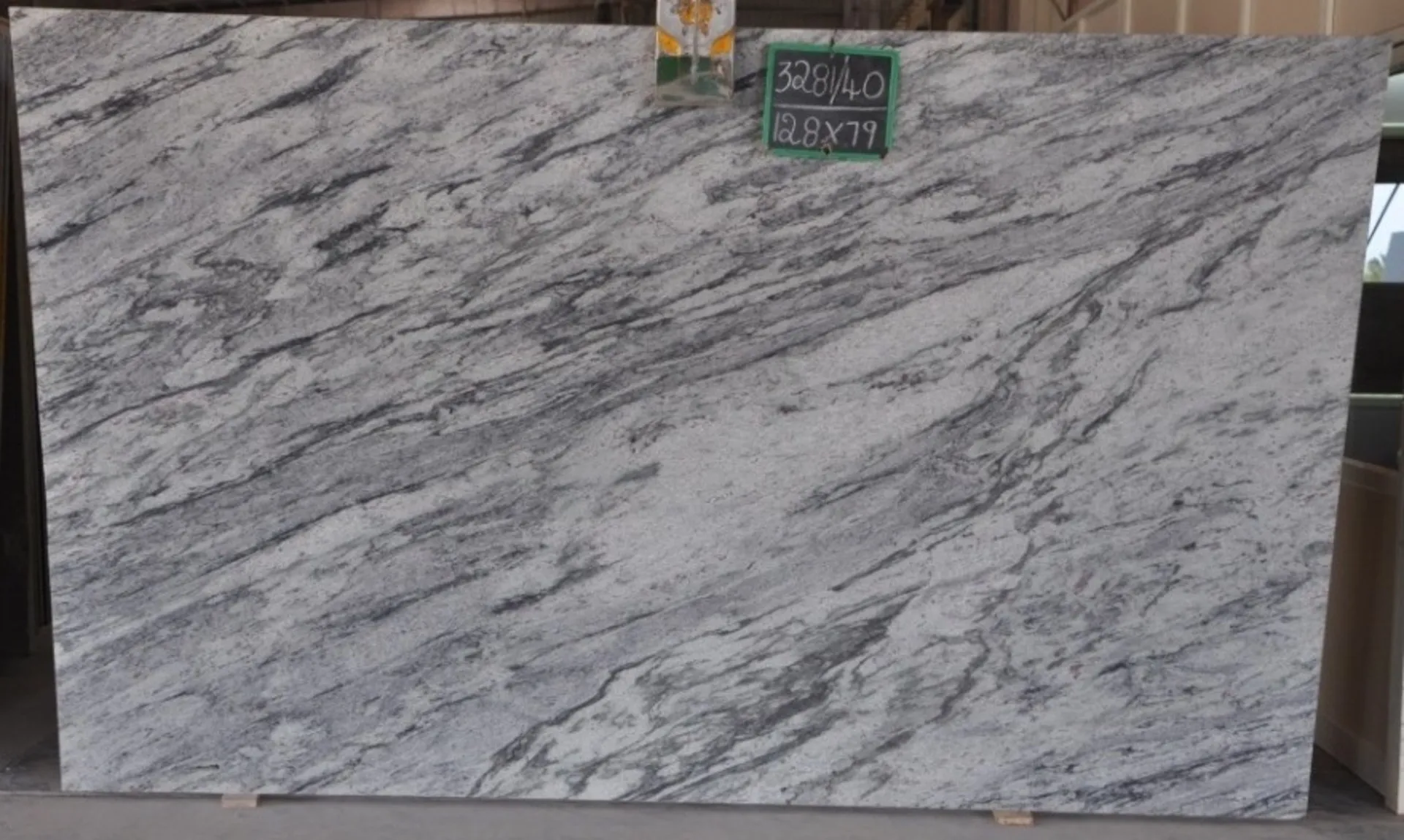 Closeup image of Glacier White 1st Choice Grey Granite countertop slab