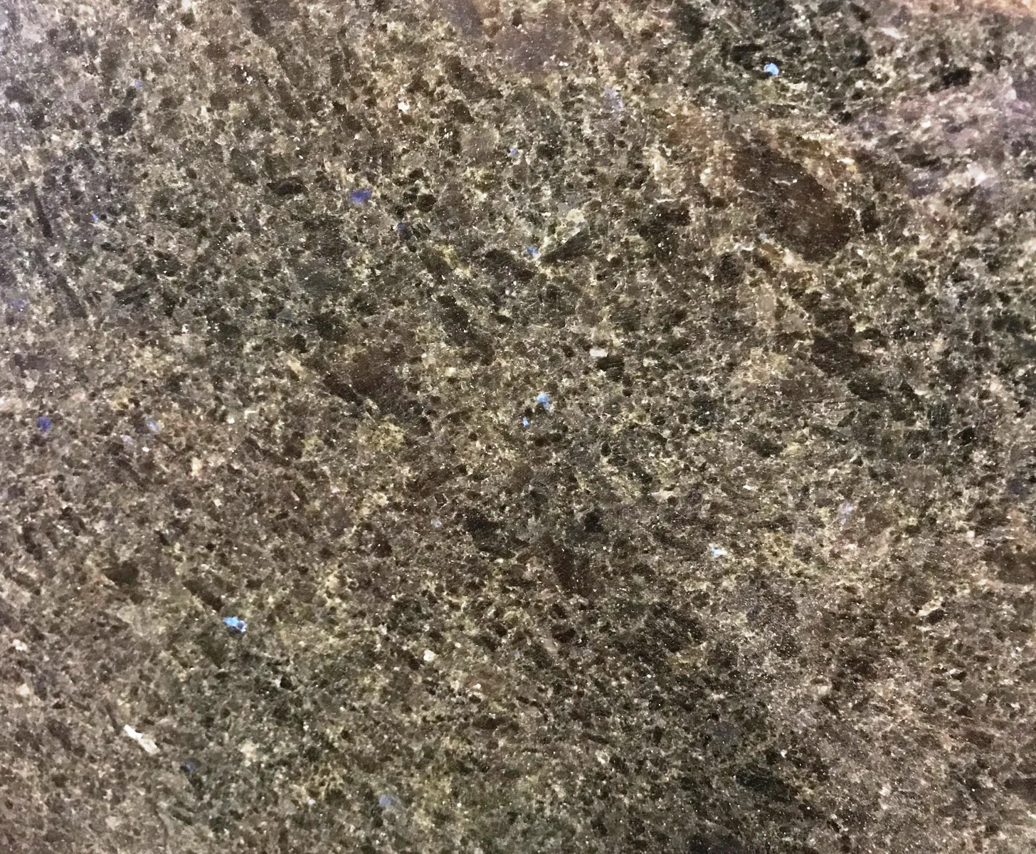 Closeup image of Blue In The Night Brown Granite countertop slab