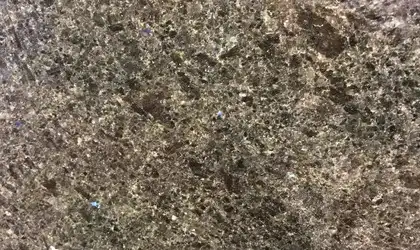 Closeup image of Blue In The Night Brown Granite countertop slab