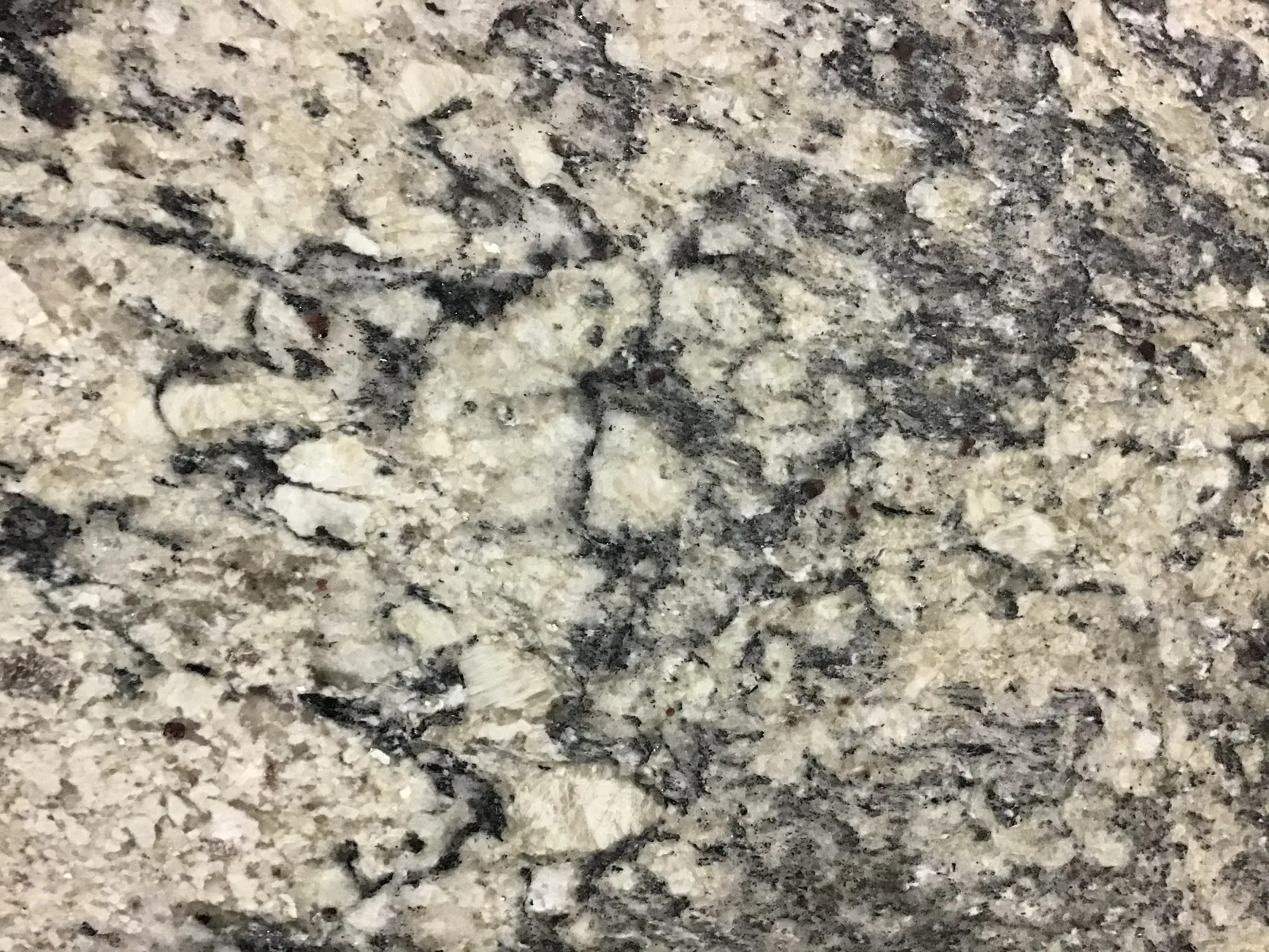 Closeup image of Taupe Beige Granite countertop slab