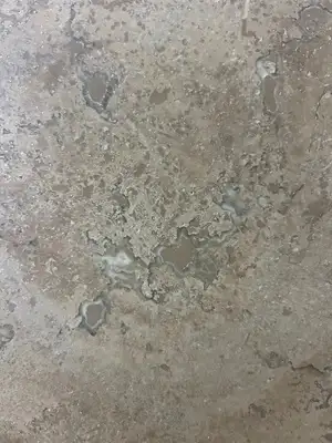 Closeup image of Noce H&F Brown Travertine countertop slab