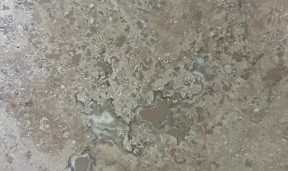 Closeup image of Noce H&F Brown Travertine countertop slab