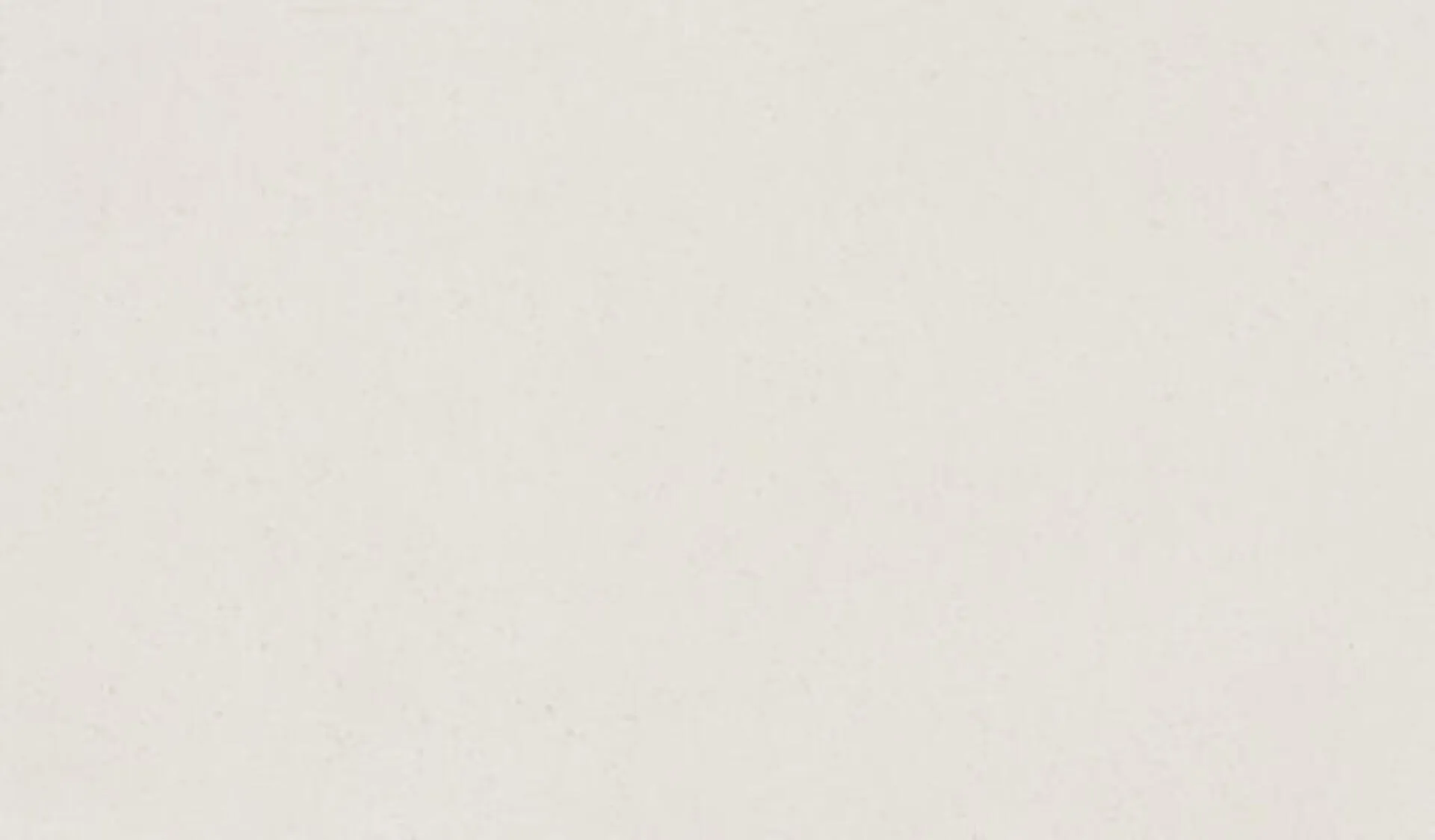 Closeup image of ONE Quartz Surfaces Jasmine White White Quartz countertop slab