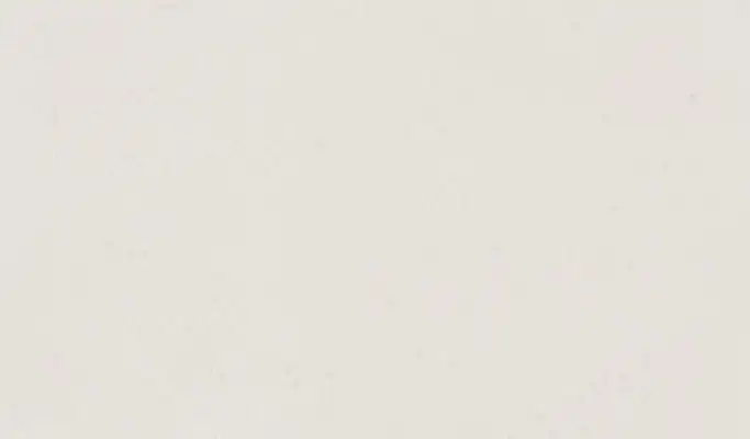 Closeup image of ONE Quartz Surfaces Jasmine White White Quartz countertop slab